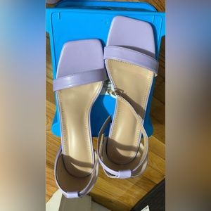 Got this pretty lilac heels, all I did was try them on, I’m not good at wearing